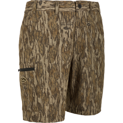 Bottomland camo shorts with logo detail, made of 92% Polyester and 8% Spandex, lightweight at 155 GSM, with built-in stretch and moisture-wicking features.