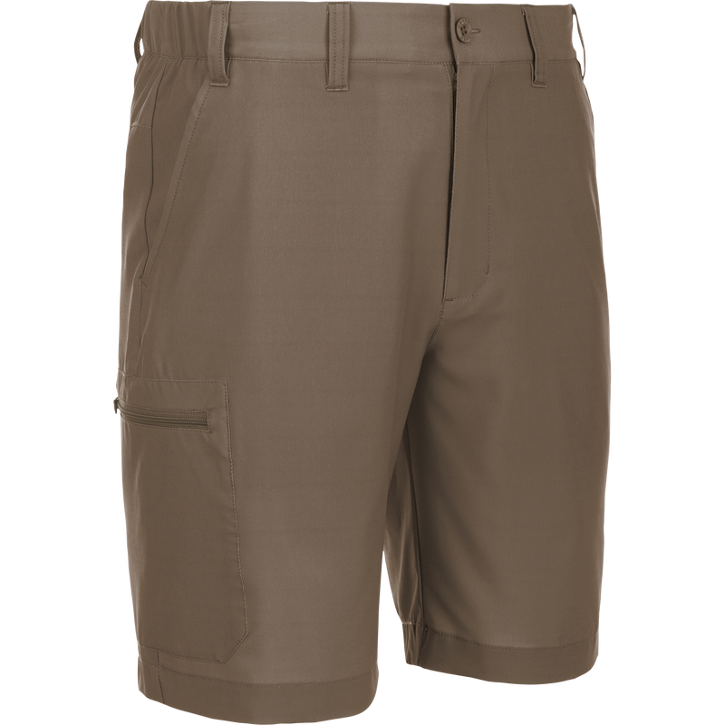 Timber Wolf Khaki Traveler Trek Short: Lightweight, stretch fabric with moisture-wicking and quick-drying features. Zippered pockets and 8.5 inseam for comfort.