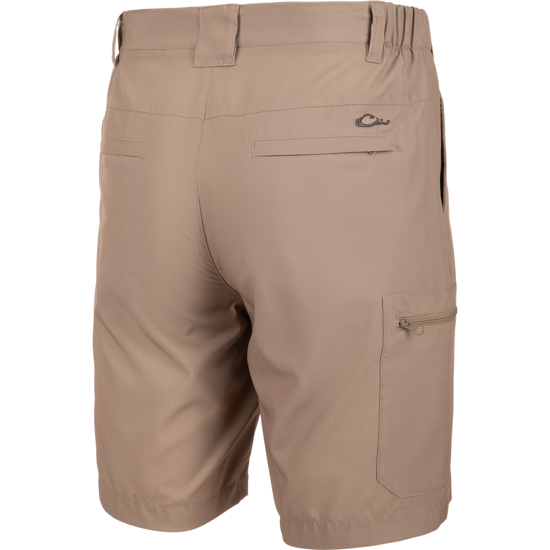 Backside of Traveler Trek Short with built-in stretch, moisture-wicking fabric, YKK zippered pockets, and 8.5 inseam. Ideal for adventures.