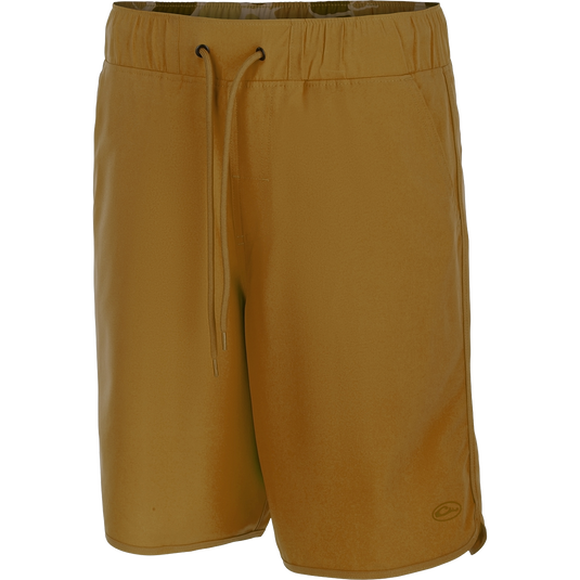 A versatile pair of Commando Lined Volley Shorts with a drawstring waist. Features include quick-drying fabric, moisture-wicking liner, and hidden zippered pockets. Perfect for beach to bar transitions.