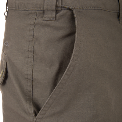 Front pocket view of the Drake 9 Pocket Ripstop Short, showcasing stitching, waistband belt loop, and durable design for versatile outdoor adventures.