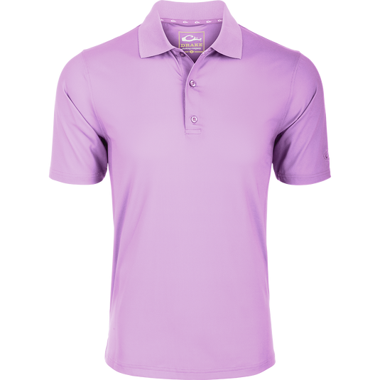 A close-up of the Performance Stretch Polo, a purple shirt with a logo button. High-performance fabric wicks moisture and stretches for outdoor activities.