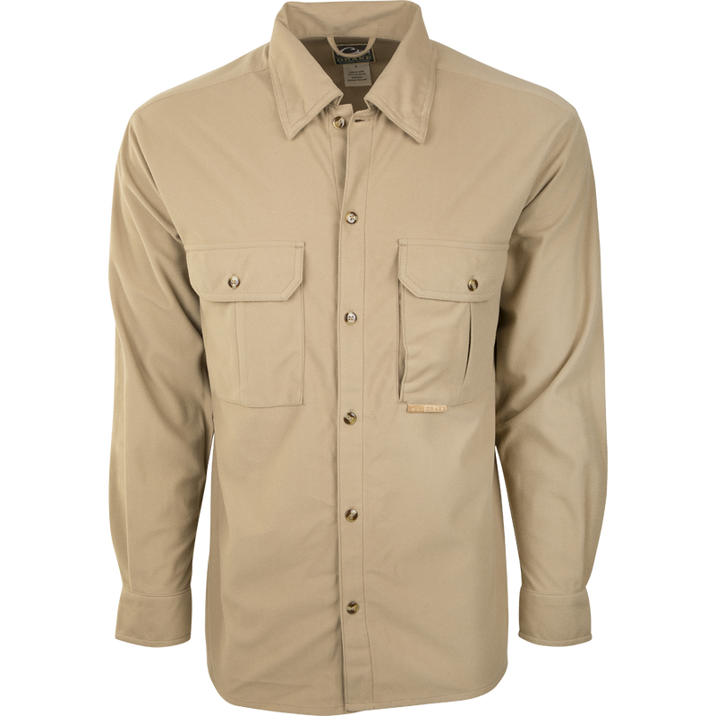 A soft, warm, and breathable Three Pocket Micro-Fleece Shirt for active outdoorsmen. Features two chest pockets with button flap closure and a hidden vertical Magnattach™ pocket.