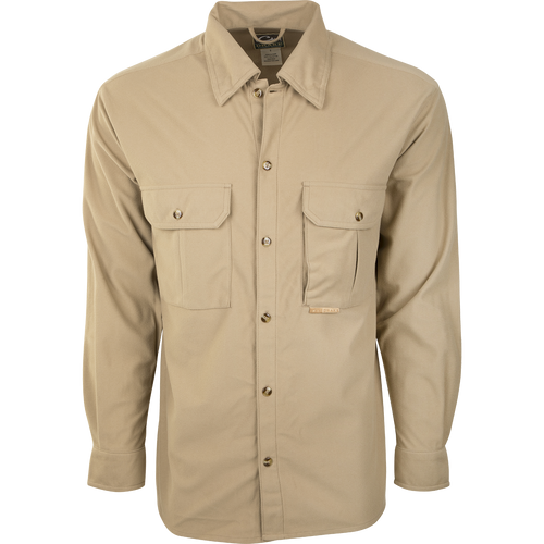A soft, warm, and breathable Three Pocket Micro-Fleece Shirt for active outdoorsmen. Features two chest pockets with button flap closure and a hidden vertical Magnattach™ pocket.