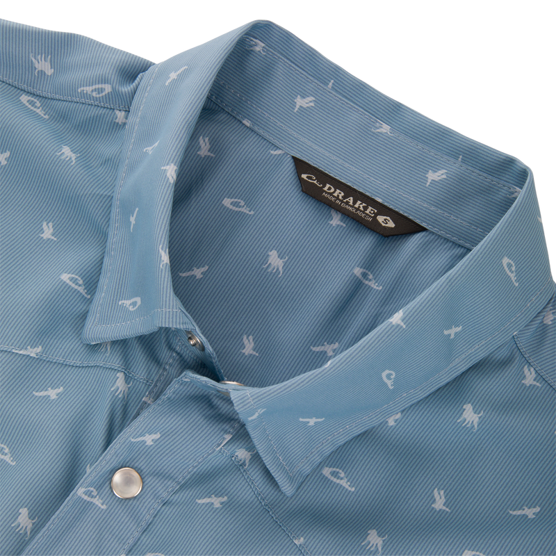 Drake Cinco Ranch Western Short Sleeve Shirt with subtle stripe texture, white animal motifs, faux pearl snaps, and vented back cape.