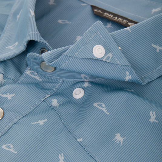 Close-up of Drake Cinco Ranch Western Short Sleeve Shirt featuring marine silhouettes, faux pearl snaps, vented back cape, and snap button chest pockets with Magnattach closure.