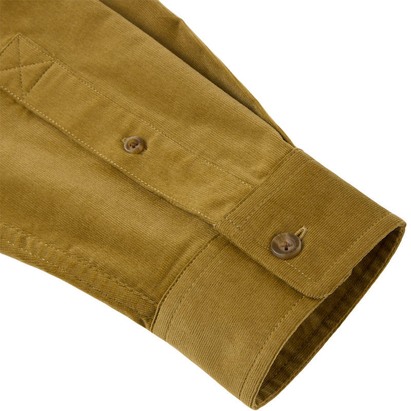 Close-up of Midwale Corduroy Shirt sleeve, showcasing textured ribs, buttoned cuff, and placket, highlighting its stretch comfort and wrinkle resistance.
