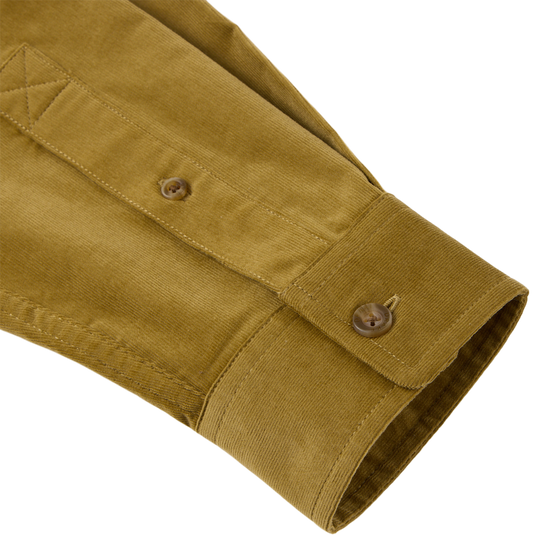 Close-up of Midwale Corduroy Shirt sleeve, showcasing textured ribs, buttoned cuff, and placket, highlighting its stretch comfort and wrinkle resistance.