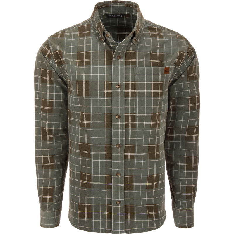 Mid-Wale Corduroy Shirt on mannequin, featuring a green and brown plaid pattern, button-down collar, chest pocket, and sculpted hem for versatile styling.