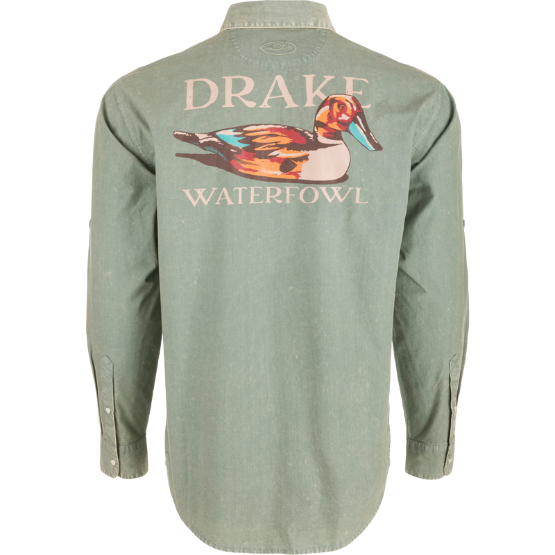Cinco Ranch Cotton Acid Wash Graphic Shirt on mannequin, featuring multicolored duck graphic and DRAKE WATERFOWL text across shoulders, highlighting vintage style and western features.