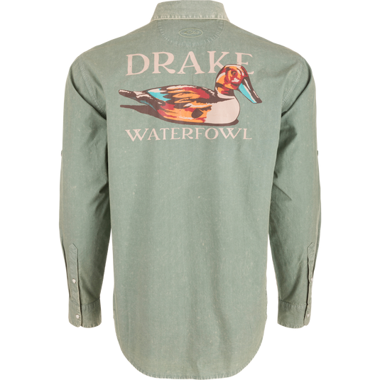 Cinco Ranch Cotton Acid Wash Graphic Shirt on mannequin, featuring multicolored duck graphic and DRAKE WATERFOWL text across shoulders, highlighting vintage style and western features.