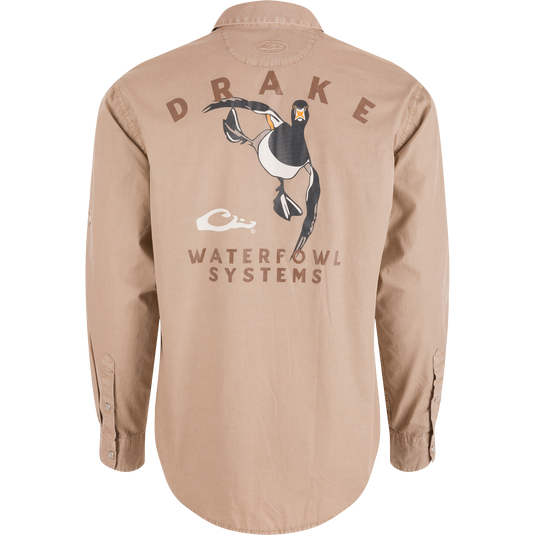Back view of Cinco Ranch Cotton Acid Wash Graphic Shirt featuring DRAKE text, flying duck graphic, and WATERFOWL SYSTEMS. Rounded hem and buttoned cuffs visible.