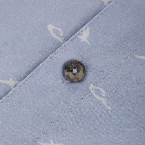 Close-up of the Cotton DDD Print Shirt featuring a subtle white motif and a grey marbled button on the placket seam.