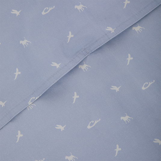 Cotton DDD Print Shirt close-up featuring light-blue fabric with small white animal and bird silhouettes, highlighting intricate stitching and seamless design. Ideal for casual, outdoor-inspired wear.