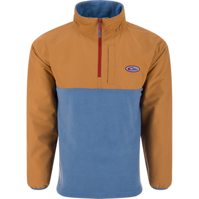 Eqwader Half Zip Pullover featuring a tan, waterproof upper and light blue, breathable fleece lower, with a red zipper and chest pocket, ideal for waterfowl hunting.