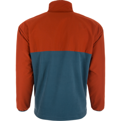 Eqwader Half Zip Pullover displayed from the back, featuring a rust-orange upper and teal-blue lower, with waterproof upper shell and breathable lower shell on a mannequin.