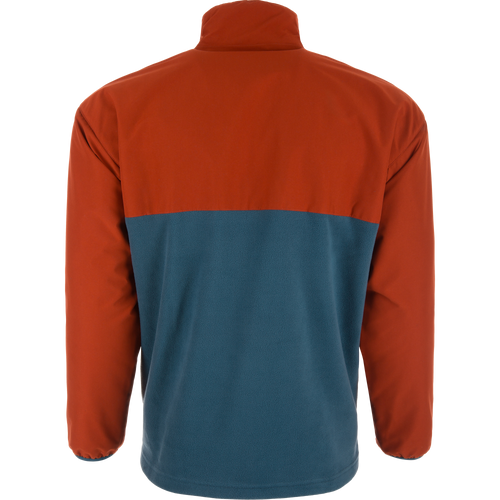 Eqwader Half Zip Pullover displayed from the back, featuring a rust-orange upper and teal-blue lower, with waterproof upper shell and breathable lower shell on a mannequin.