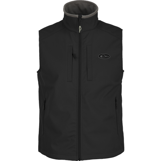 A Windproof Soft Shell Vest with multiple pockets, adjustable waist, and stretch cuffs. 100% polyester shell with bonded grid fleece lining.