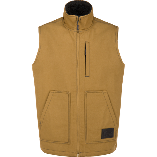 Antique Bronze Canvas Sherpa Lined Work Vest with a sherpa-lined interior, zip-up front, high collar, two hand pockets, and a vertical chest pocket.