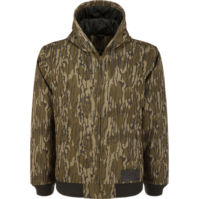 Lifestyle Duck Canvas Work Jacket in Mossy Oak Original Bottomland featuring a hooded design, front zipper, and dark ribbed trim at the waist and cuffs.