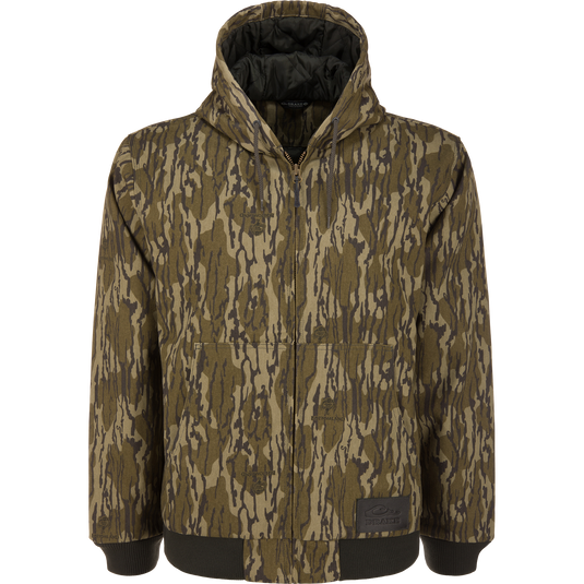 Lifestyle Duck Canvas Work Jacket in Mossy Oak Original Bottomland featuring a hooded design, front zipper, and dark ribbed trim at the waist and cuffs.