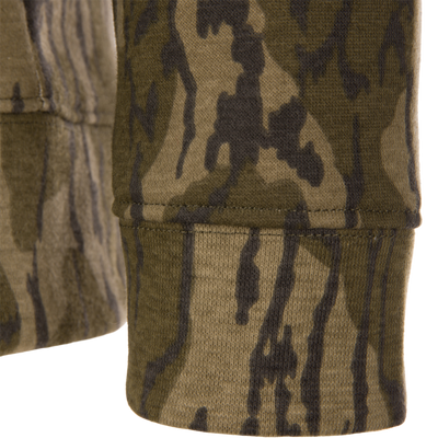 Close-up of the Three End Full Zip Work Hoodie's camo-pattern knit fabric, highlighting cuff stitching, showcasing its blend of comfort, mobility, and functional design.