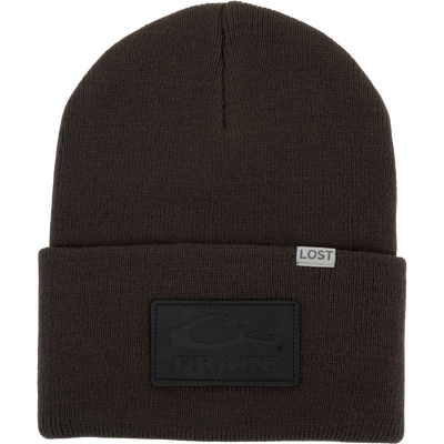 Lost Hat Work Beanie featuring a woven LOST tag and embossed DRAKE patch, with a 4 flip cuff and 9 seamless Jacquard construction.