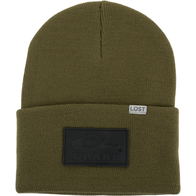 Lost Hat Work Beanie, olive-green knit with a DRAKE patch, features a 4 flip cuff and 9 length, ideal for quality fit enthusiasts.