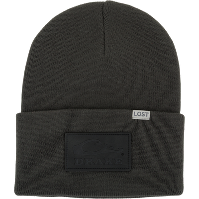 Lost Hat Work Beanie with 4 flip cuff, seamless Jacquard construction, and embossed DRAKE logo tag, ideal for quality fit and comfort.