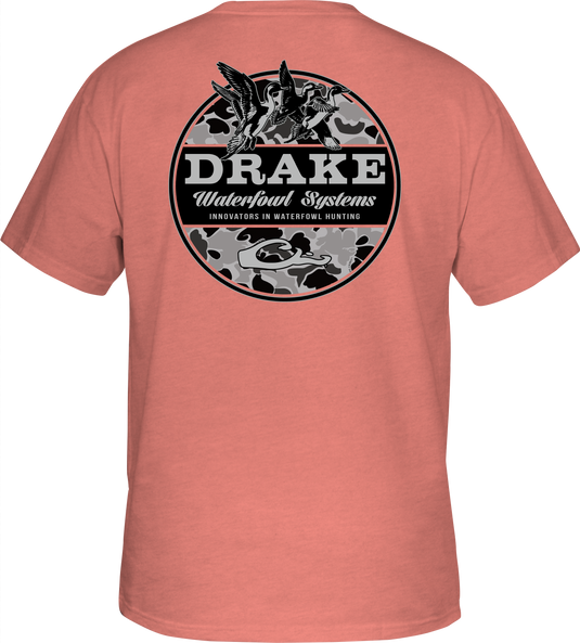 A back view of the Old School Circle T-Shirt with a Drake logo on the front pocket. Ducks in flight from the Old School Camo Series are depicted on the back of this lightweight, 60% cotton/40% polyester blend graphic tee.