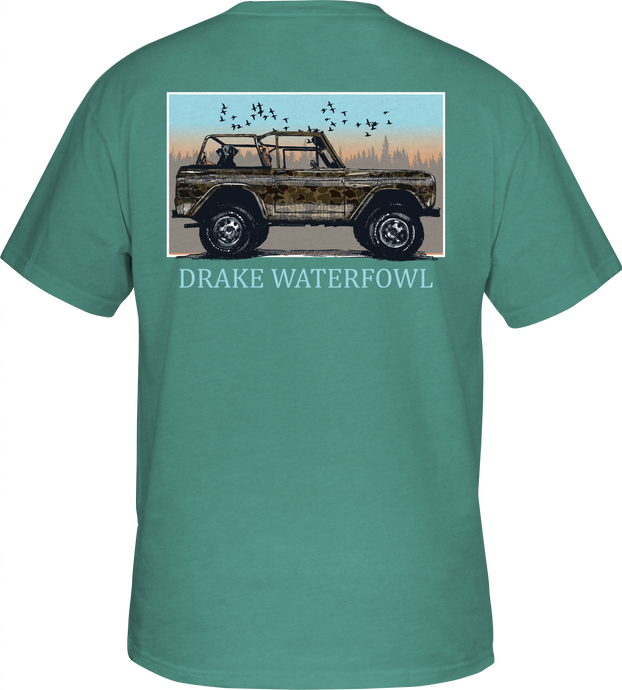 Old School Ride Along T-Shirt: Back of a green shirt with a car and birds, featuring Drake logo pocket and exclusive Old School Camo.