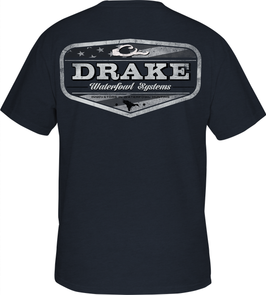 Blackout Badge T-Shirt with Drake logo on front pocket and Americana badge overlay graphic from Americana Drake Series of back graphic tees.