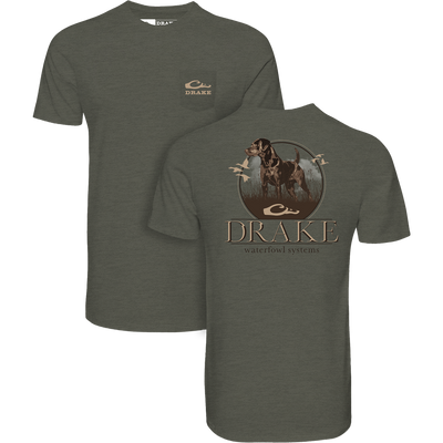 Standing Black Lab T-Shirt features a hunting dog with ducks graphic and DRAKE text. Includes front pocket with Drake logo, emphasizing comfort and style.
