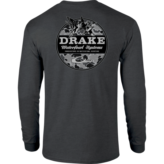 A Drake Waterfowl Old School Circle Long Sleeve T-Shirt featuring a logo of ducks in flight on a grey shirt. Made of 60% cotton and 40% polyester for comfort.