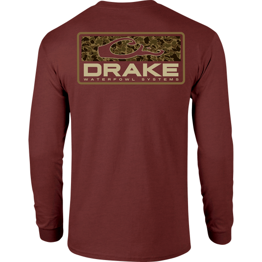 A long-sleeved Old School Bar T-shirt with a Drake logo on the front pocket and a camo-themed Drake logo on the back. Made of 60% cotton and 40% polyester for comfort.