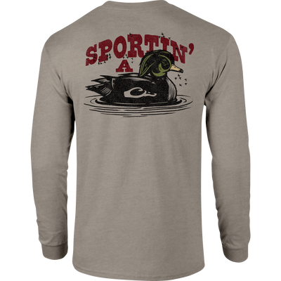 Sportin A Woodie Long Sleeve T-Shirt featuring front pocket Drake logo and back graphic, crafted from a soft 60% cotton, 40% polyester blend.
