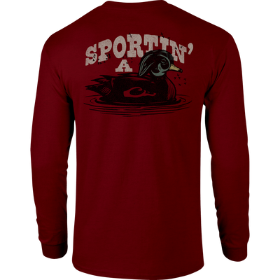 Sportin A Woodie Long Sleeve T-Shirt with front pocket Drake logo and back graphic, crafted from a soft cotton-polyester blend for comfort.