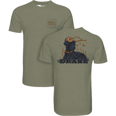 Lab Lounging T-Shirt featuring a retriever graphic with a camouflage cap, set in a marsh scene, alongside a logo-pocketed olive-green shirt from Drake.