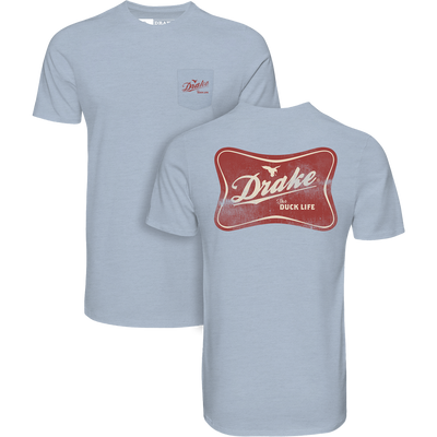 Two overlapping light-blue Drake Life T-Shirts with red duck logo and script on front; rear shirt shows pocket with logo and tagline.