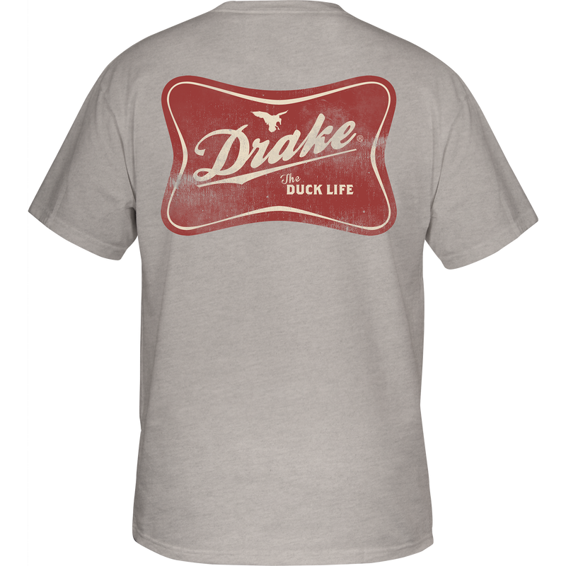 The Drake Life T-Shirt features a front pocket with the Drake logo and a back graphic of a duck, crafted from a cotton-polyester blend.