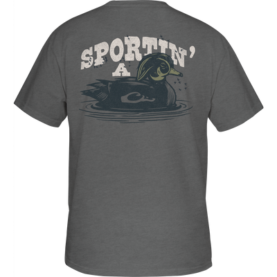 Sportin A Woodie T-Shirt featuring the Drake logo on the front pocket and a Sportin a Woodie graphic on the back, made from a soft cotton-polyester blend.