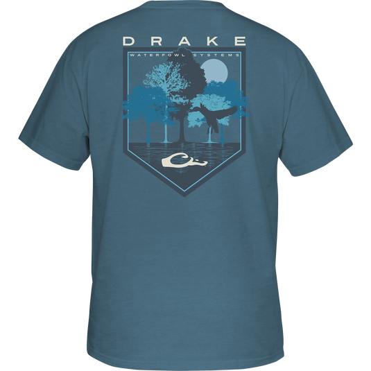 Alt text: Tall Oak T-Shirt featuring Drake logo on front pocket, back graphic of Oak Trees under moonlight. 60% cotton, 40% polyester blend for comfort. From Drake Waterfowl, known for premium hunting and casual apparel.