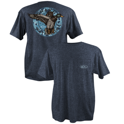 A close-up of the Circle Mallard T-Shirt from Drake Waterfowl, featuring a Drake logo on the front pocket and a vintage Mallard graphic on the back. Constructed with a 60% cotton/40% polyester blend for comfort.