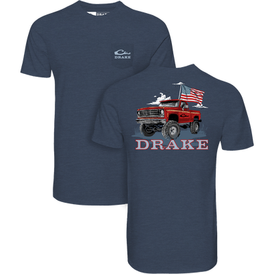 Americana Flag Truck T-Shirt featuring a red pickup and American flag design on the back, with a small Drake logo on the front pocket.