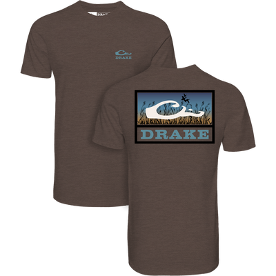 Marsh Flight T-Shirt with front chest Drake logo and back marsh scene graphic, crafted from soft garment-washed cotton, reflecting Drake Waterfowl's outdoor apparel expertise.
