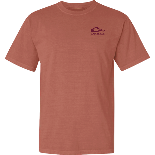 Don’t Let Em Behind You T-Shirt features a rust-colored design with a maroon wave logo and 'DRAKE' text on the chest, crafted from soft 100% cotton.