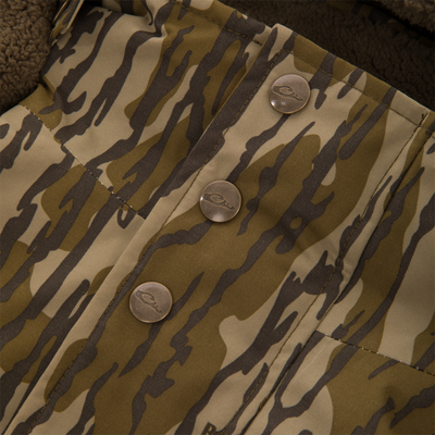 Close-up of the Throwback 80 Insulated Sport Bomber Jacket, featuring tiger-stripe camo, brass snap buttons, and peek of fleece lining.