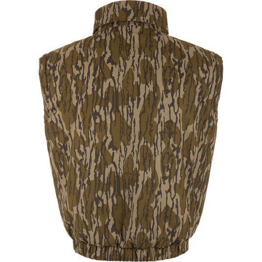 Throwback 80 Sport Vest from Drake Waterfowl, featuring a camouflage pattern, stand-up collar, elastic waistband, and large accessory pockets, ideal for outdoor adventures.