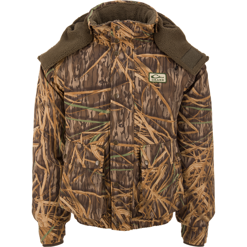 Throwback 80 Sport 3-in-1 Jacket with camouflage, insulated lining, removable fleece hood, large pockets, and elastic cuffs, ideal for versatile hunting and outdoor activities.