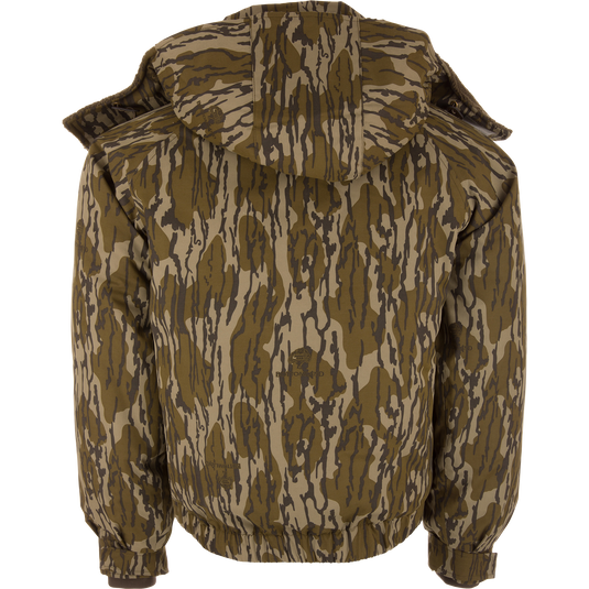Back view of the Throwback 80 Sport 3-in-1 Jacket with a tiger-stripe camo pattern, featuring a hood, ribbed cuffs, and hem for versatile all-weather protection.